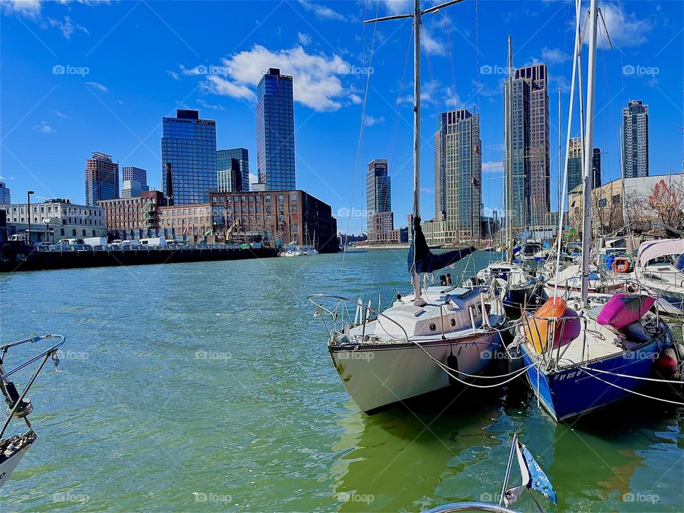 This is “Newtown Creek” by the “Pulaski Bridge” in LIC, Queens seen from one of the boats moored here called “Salvation”, the “28 ft 1969 Luhrs” cabin cruiser that I and my partner “Timothy Trespas” call home. 2024. Hypnotic Productions