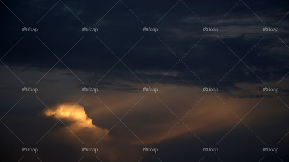 A bright peaceful spot in a dark stormy sky