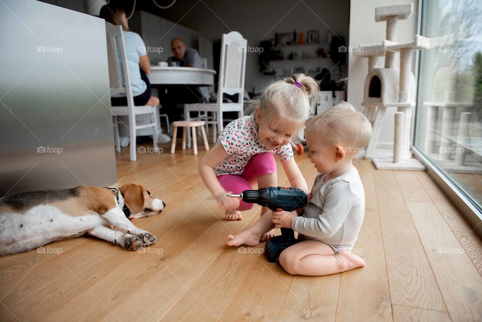 Two kids playing at home