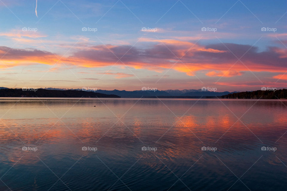 Dramatic sky reflecting in sea