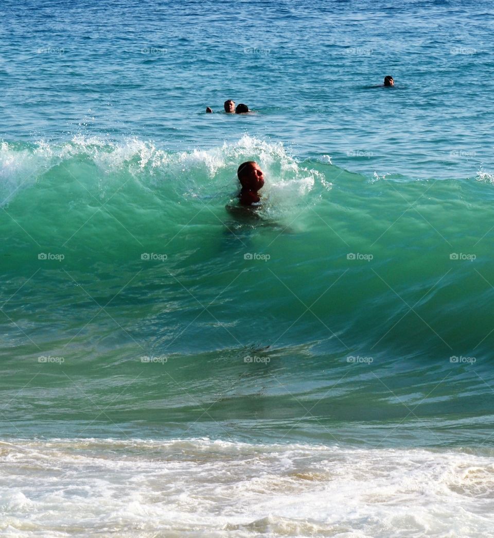 Close-up of a man swimming in sea