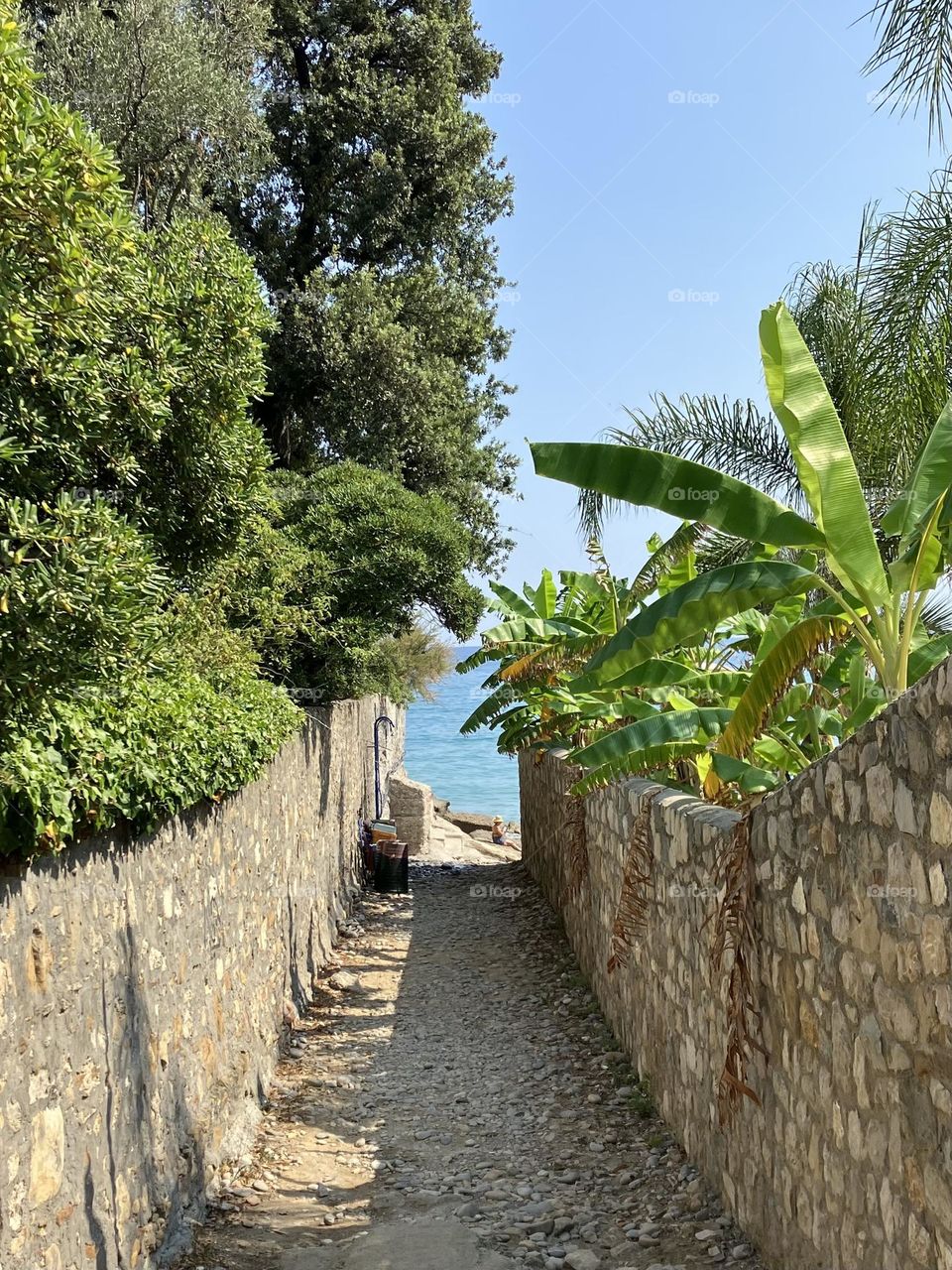 In a narrow alley leading to the sea