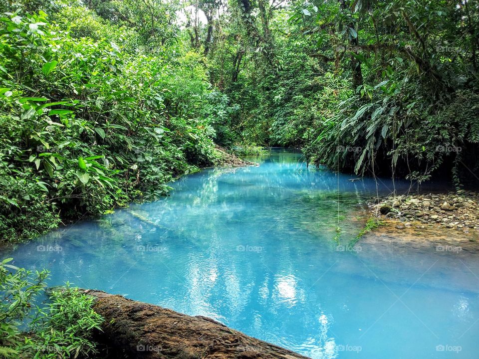 volcanic blue river in costa rica