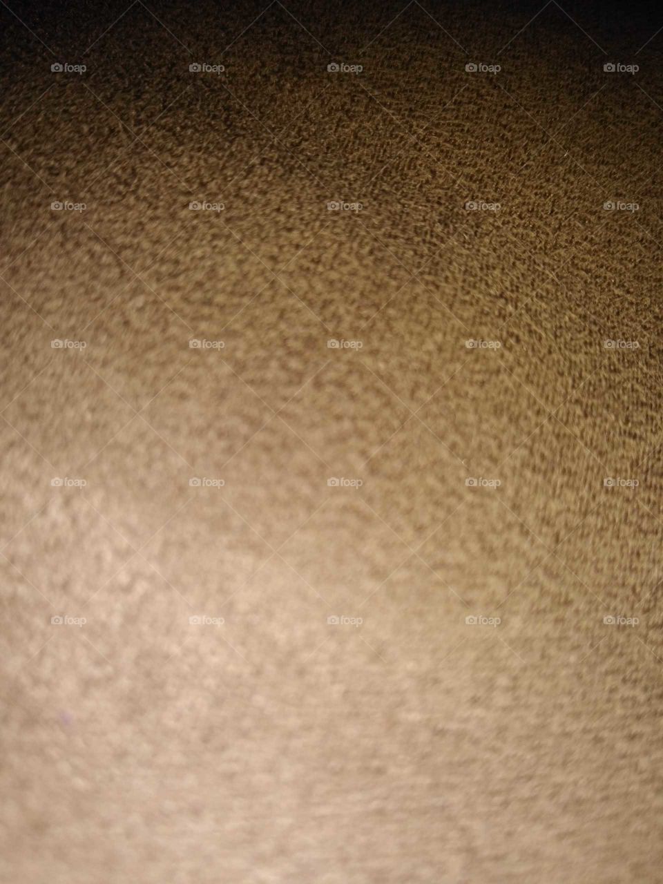 a cloth on the recliner chair