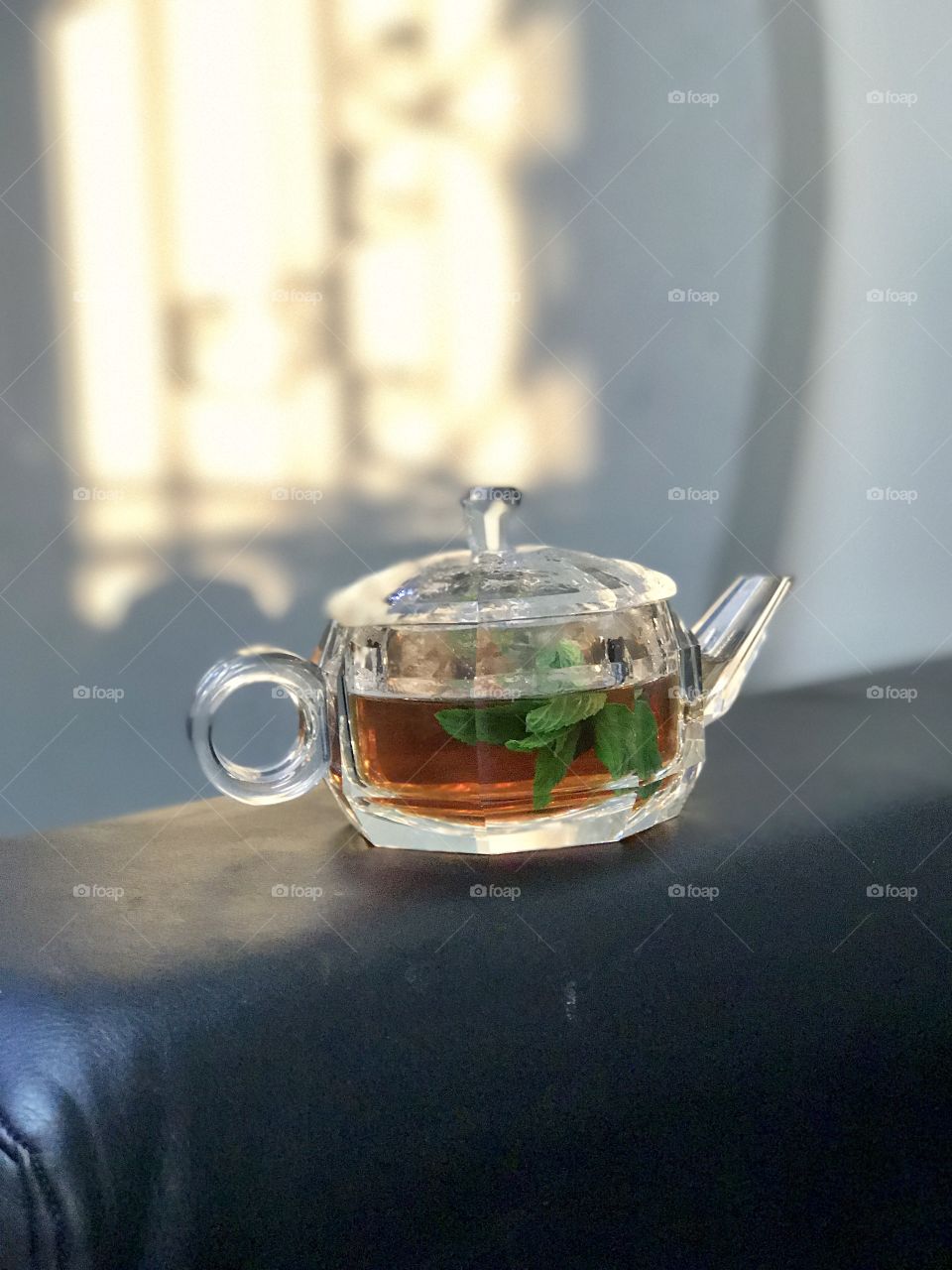 Close-up of teapot containing tea