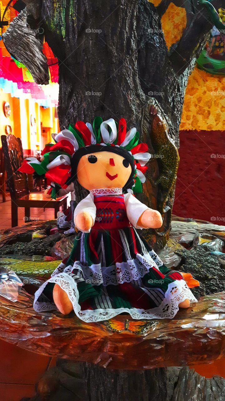 Mexican doll,doll,Mexican,toys,colorful,table,chair,dress,México,culture,ribbon,embroidery