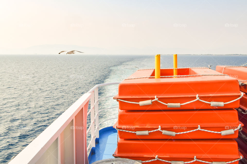 Seagulls Flying Behind The Ship
