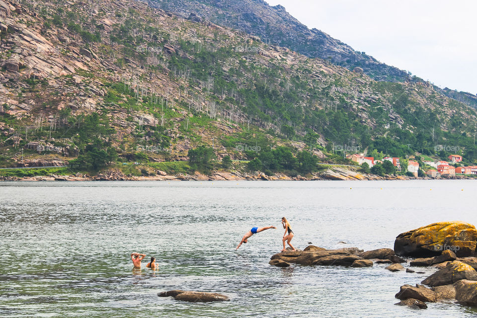 enjoying the beach in Ézaro, Spain