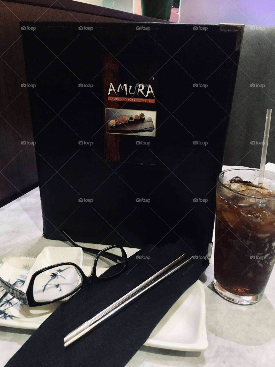 Coke, menu and glasses