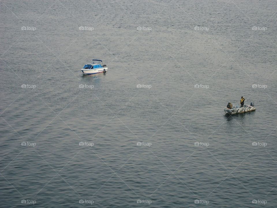 Two fishing boats on the river Dnepr