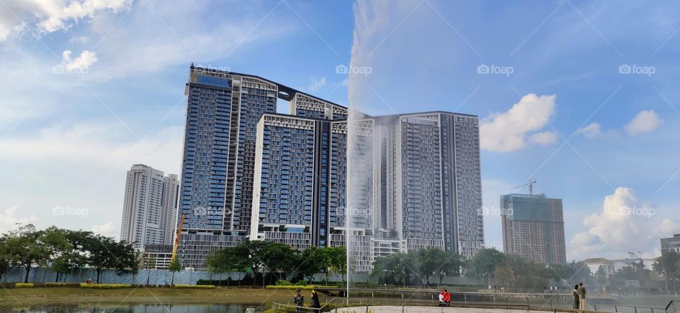 Luxury Condo and water fountain.