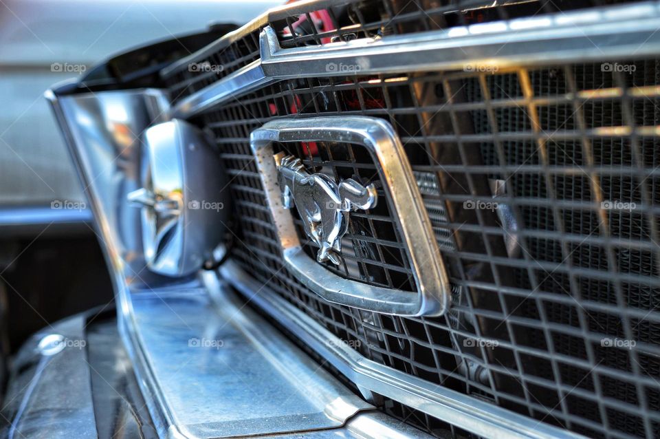 ford mustang with open hood for repair