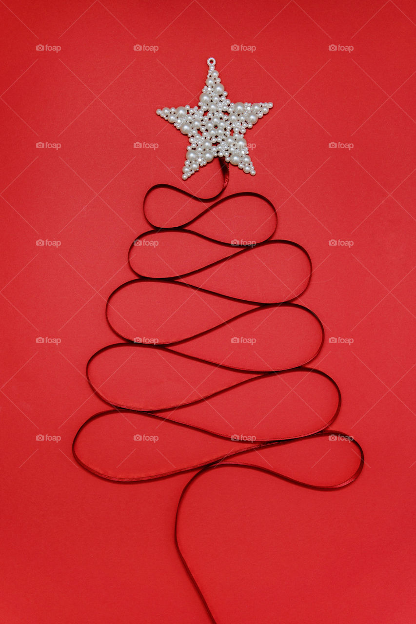 christmas tree made of ribbon with star on top