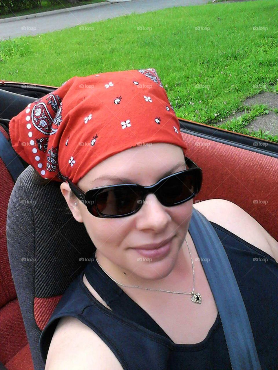self-portrait in convertible car