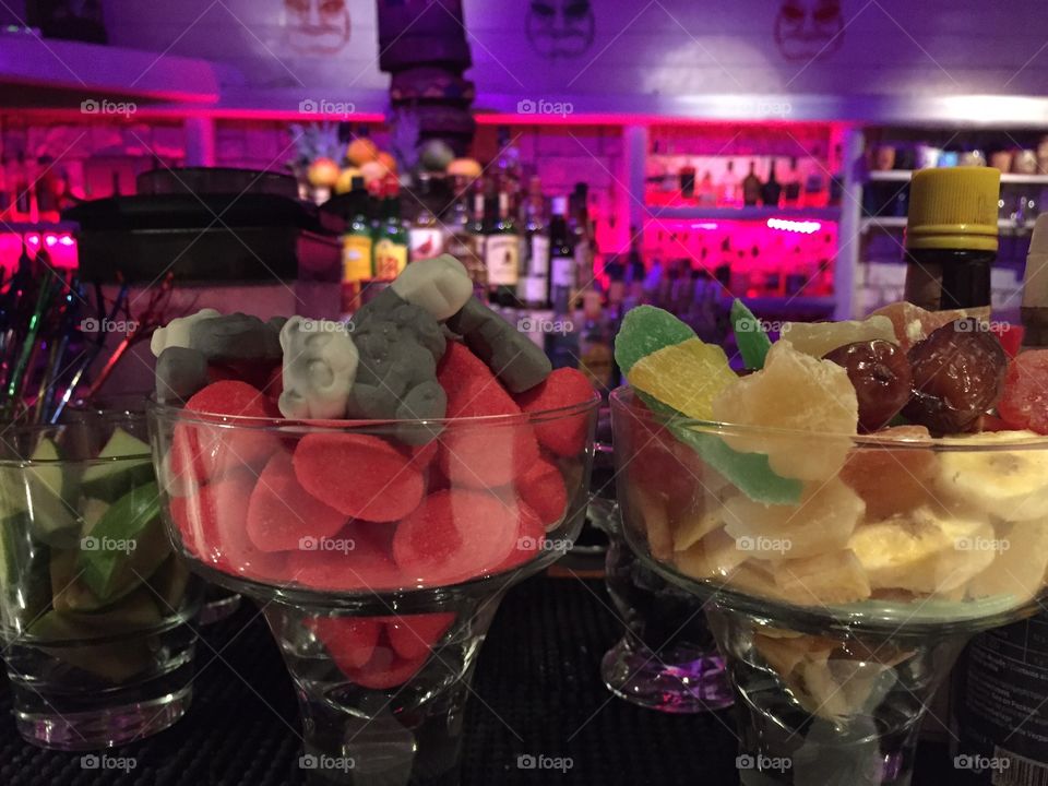 Bowls of sweets an a bar