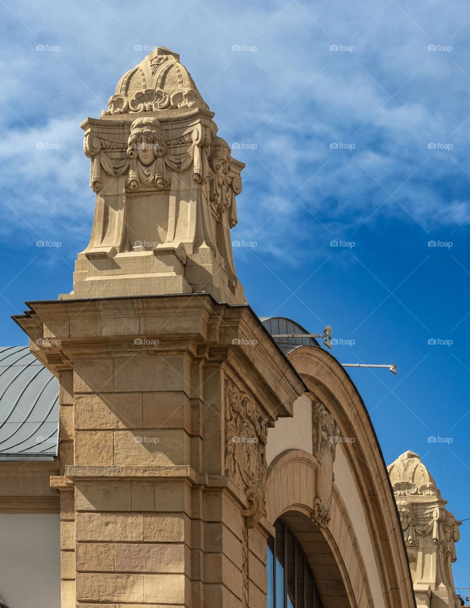 close-up of a fragment of the renovated facade of the old station building