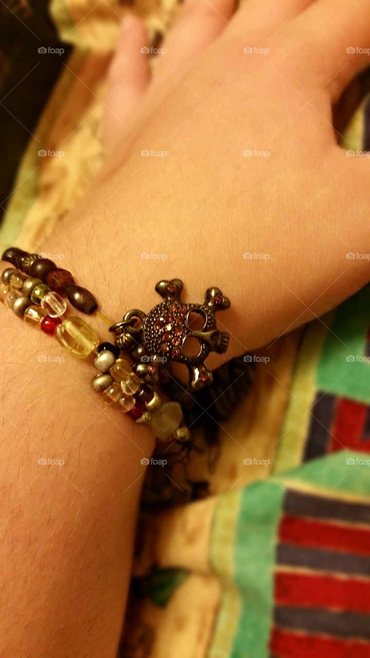 Skull and beads beaded bracelets made by me.