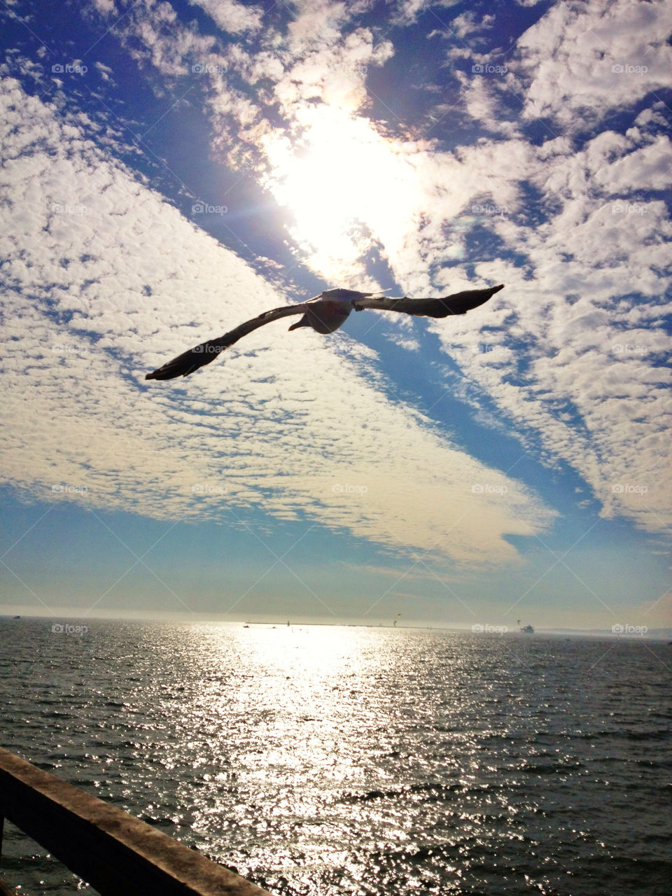 ocean sky blue clouds by analia