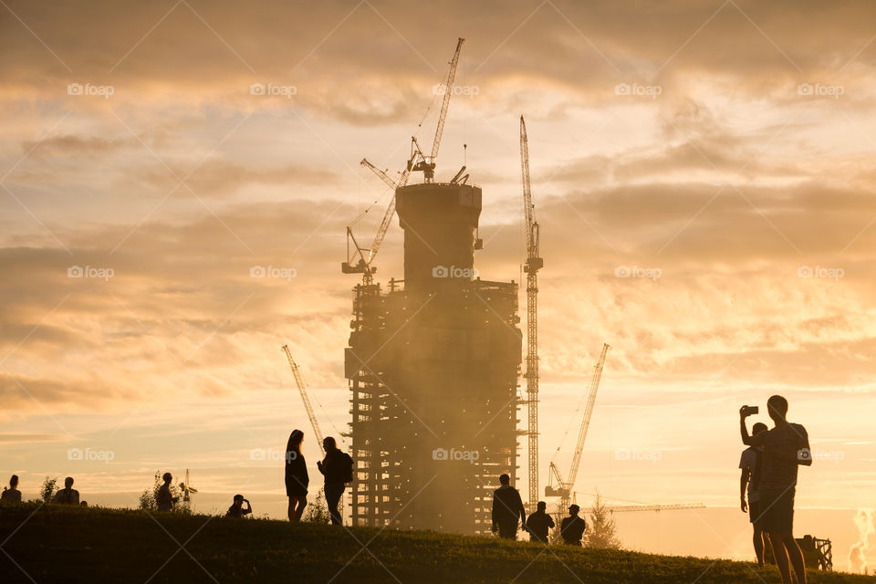 unusual view of the construction of the house at sunset