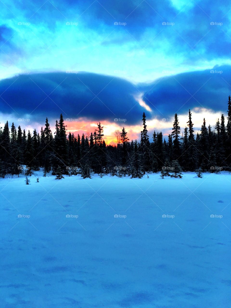 Sunset in snowy landscape 
