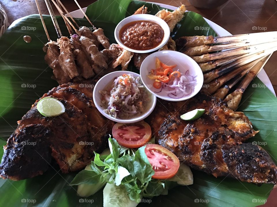 Satay and fish for lunch