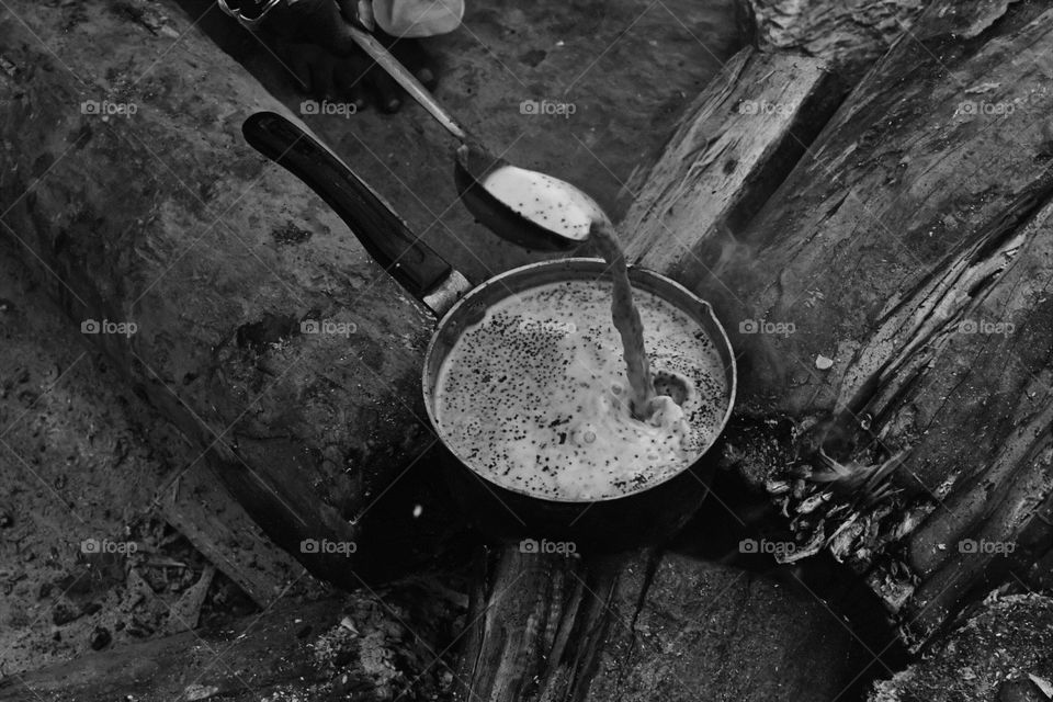 Making Tea  in the wood fire in  cold Morning in kathmandu nepal 
