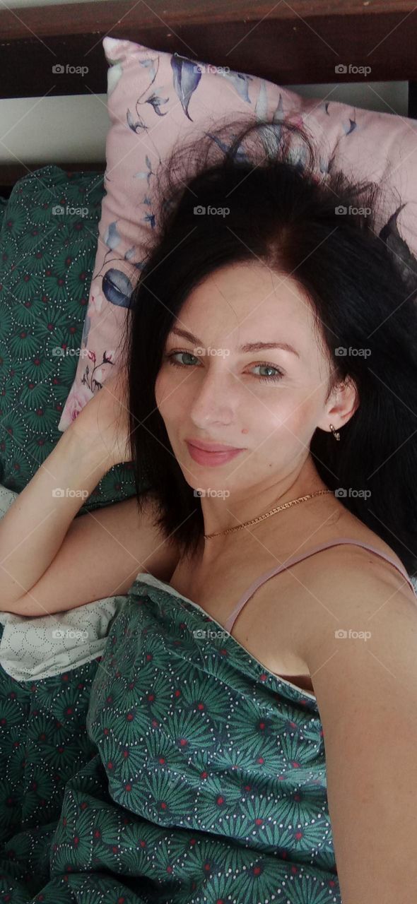 Selfie in the morning bed.