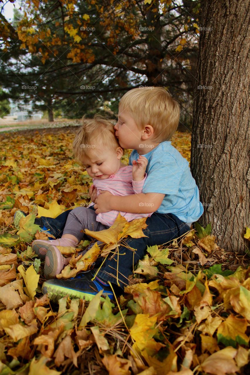 Kids in leaves
