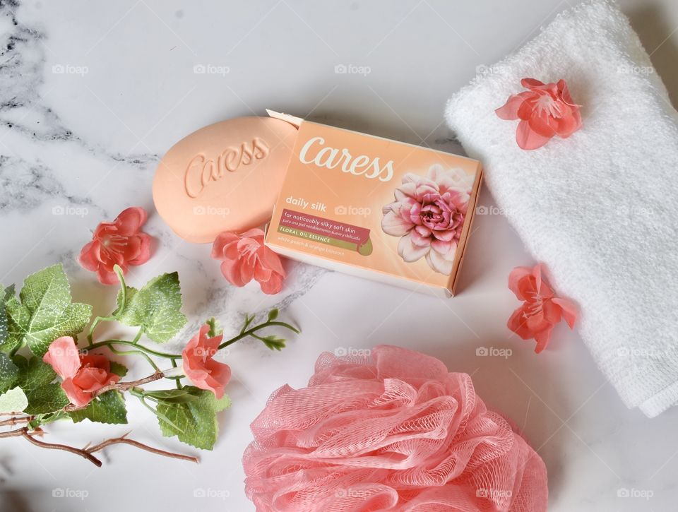 Relax with skin care, soap and flowers