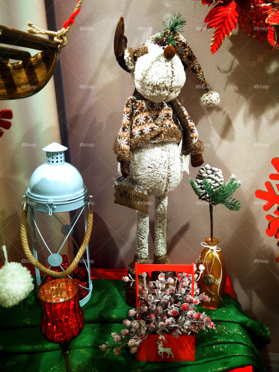 Shop window.  Plush deer and attributes of the New Year