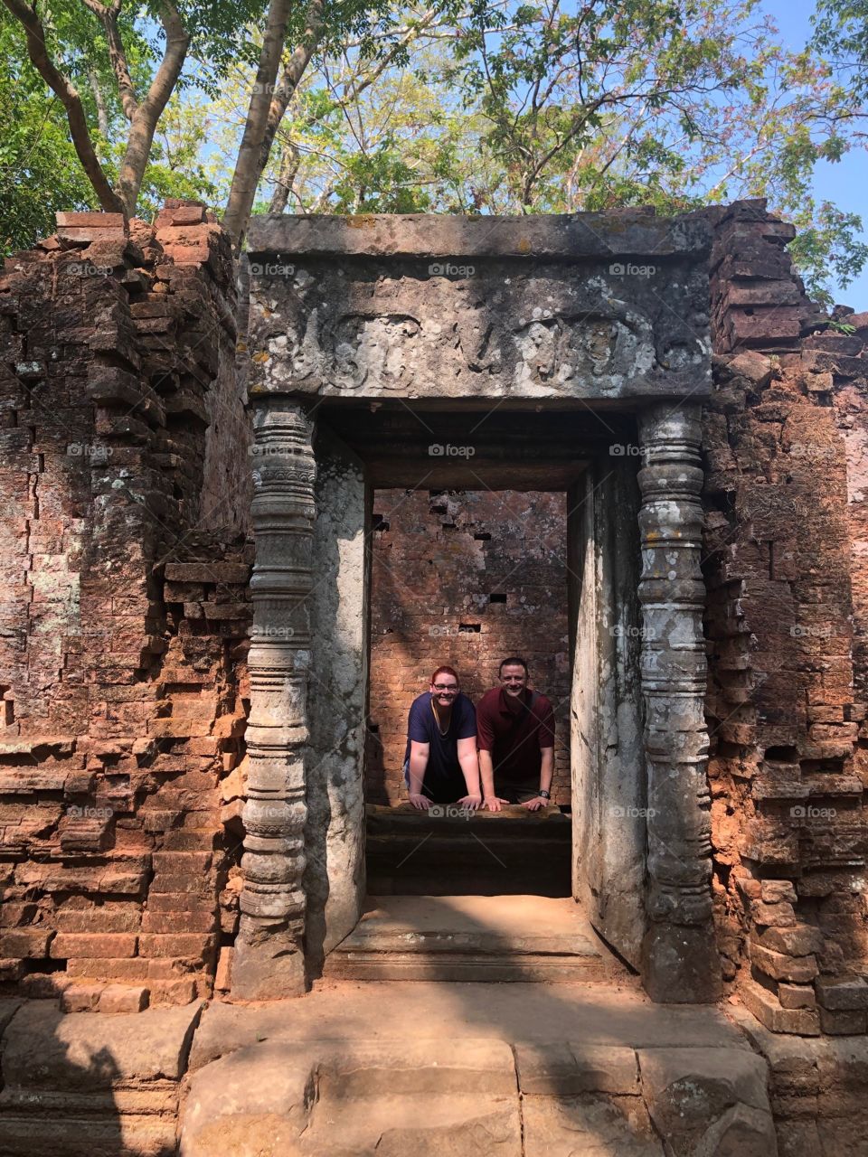 Hindu And Buddhist Columns In The Cambodian Temple