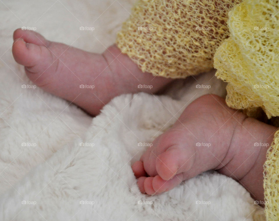 cute baby feet and tiny toes. adorable little baby feet