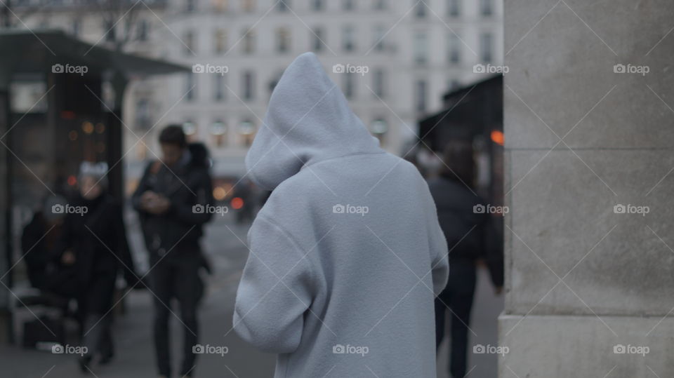A hooded person