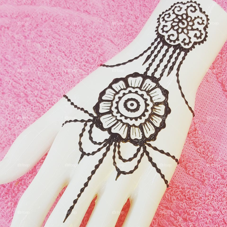 henna hand example at our shop.