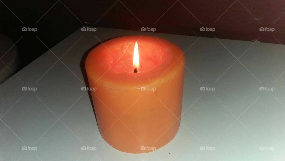 an orange candle