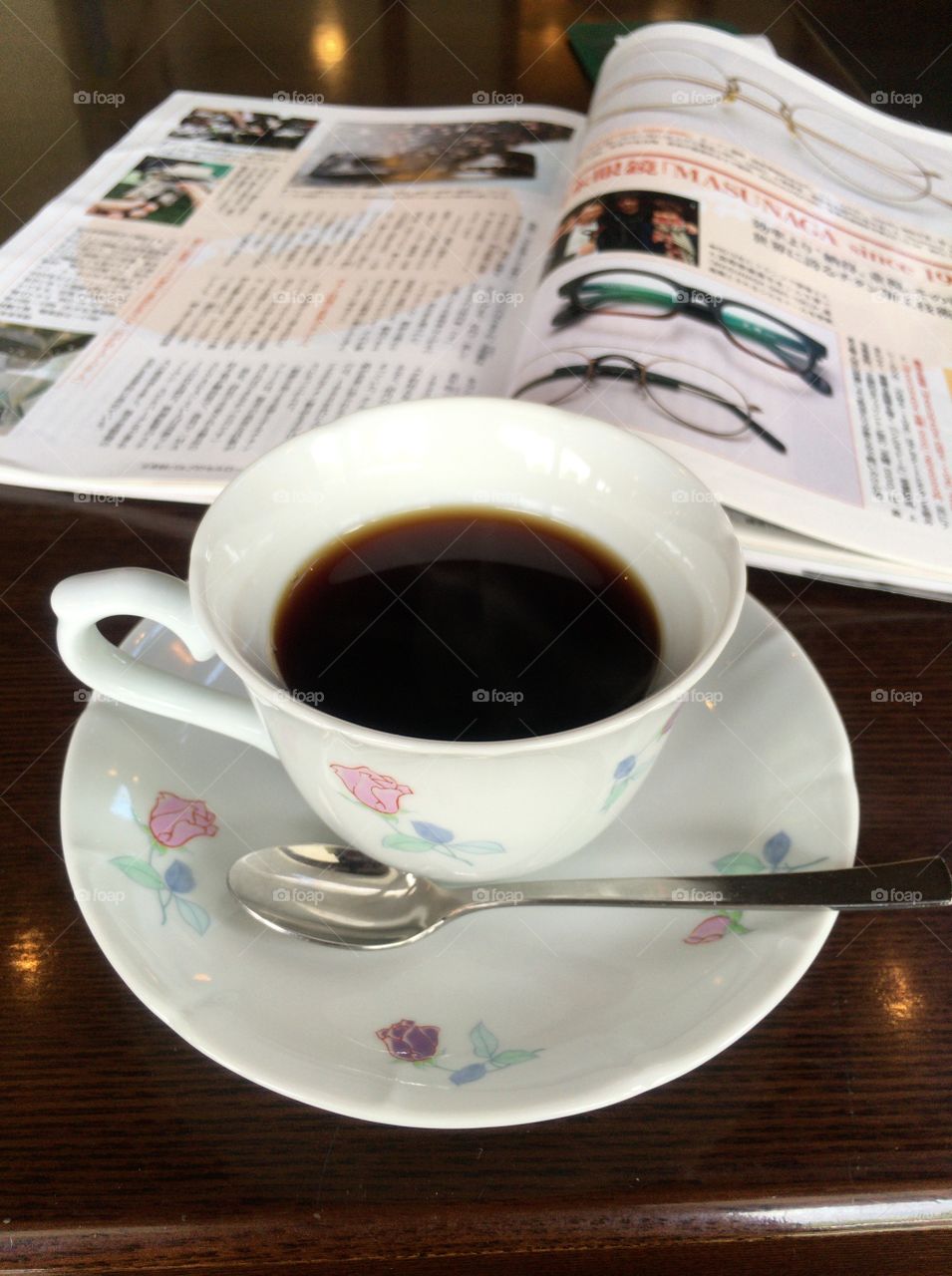 A cup of coffee and Japanese magazine