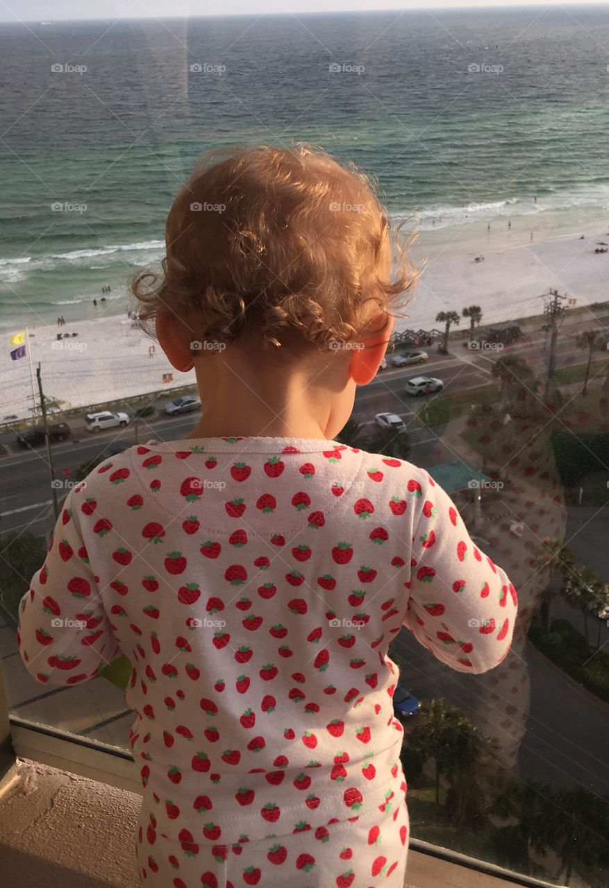 She can't wait to put her feet in the sand for the first time!