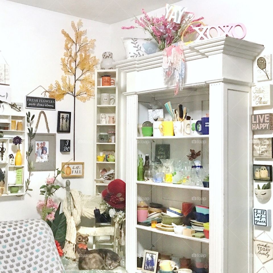 White display shelves loaded with a collection of treasures!