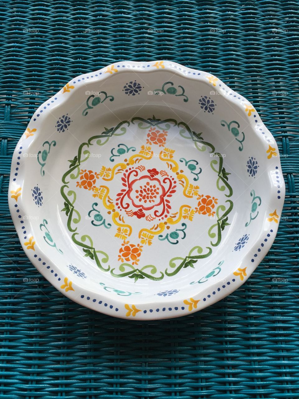 Summertime Dish. Colorful dish on a wicker table 