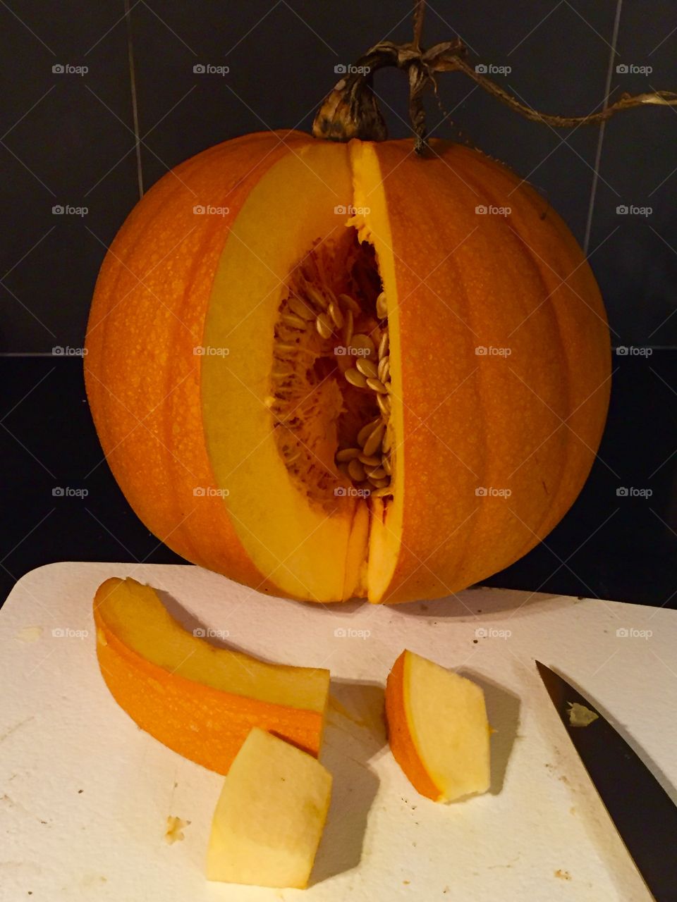 Cutting a pumpkin