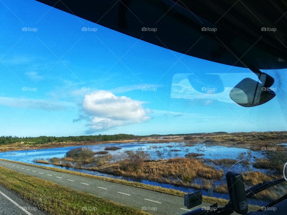 Bike path in Denmark. View from truck on the backwaters.