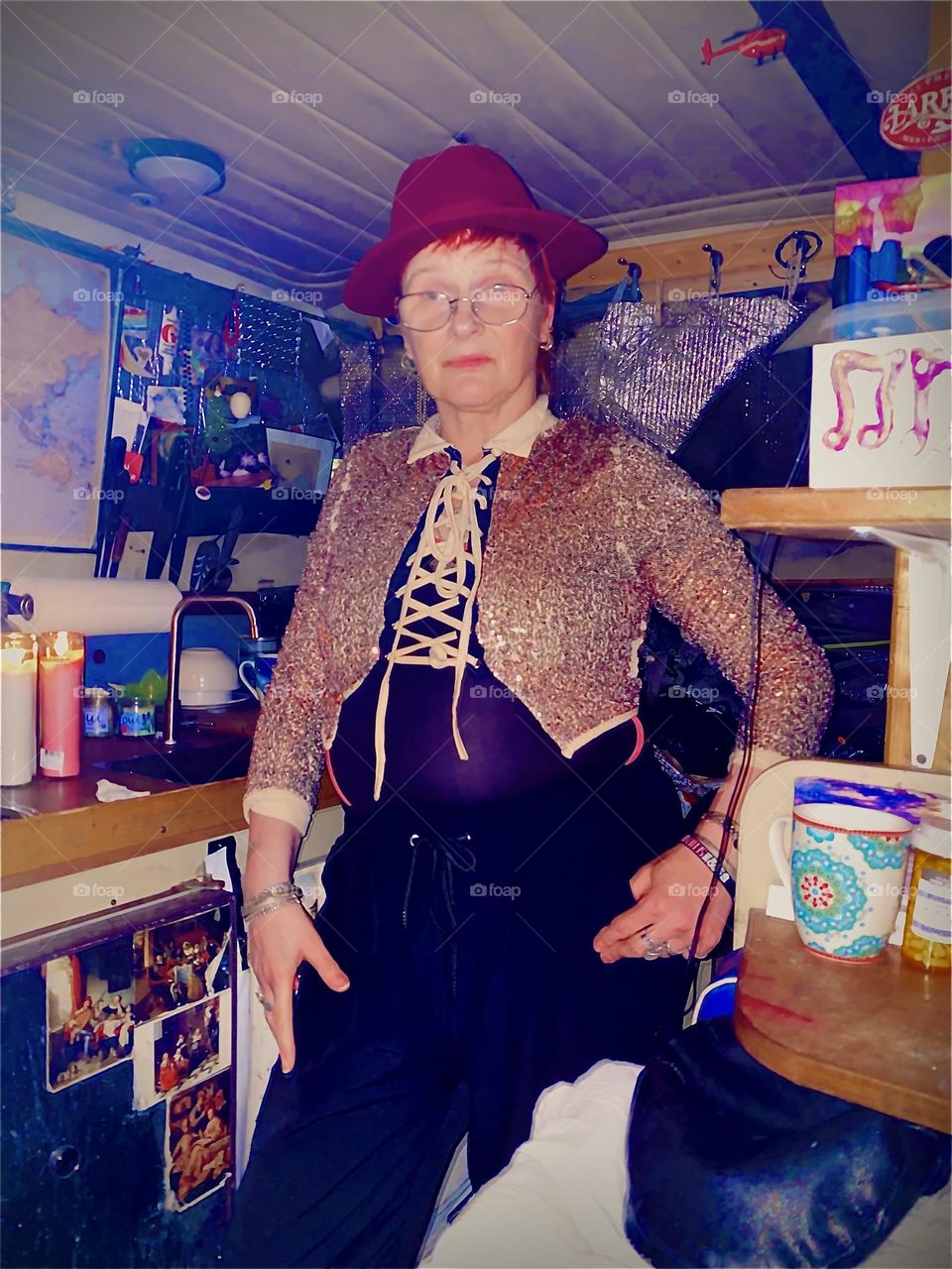 Aboard „Salvation“ all dressed up theatrical for the holidays in a gold sequins bolero jacket and wearing my favorite red Fedora hat. 2022. Hypnotic Productions