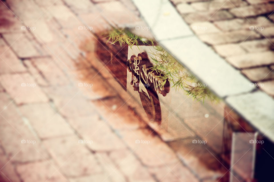 Reflection of commercial sign