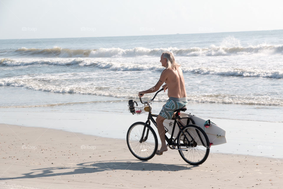 Biking surfer
