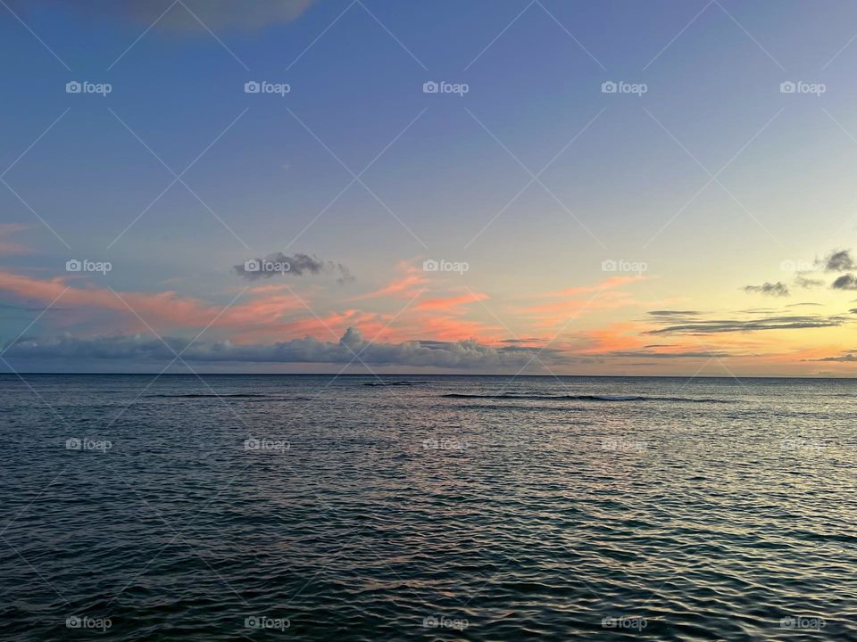 Beautiful sunset over Kaluahole Beach from the Elks Lodge in Honolulu Hawaii