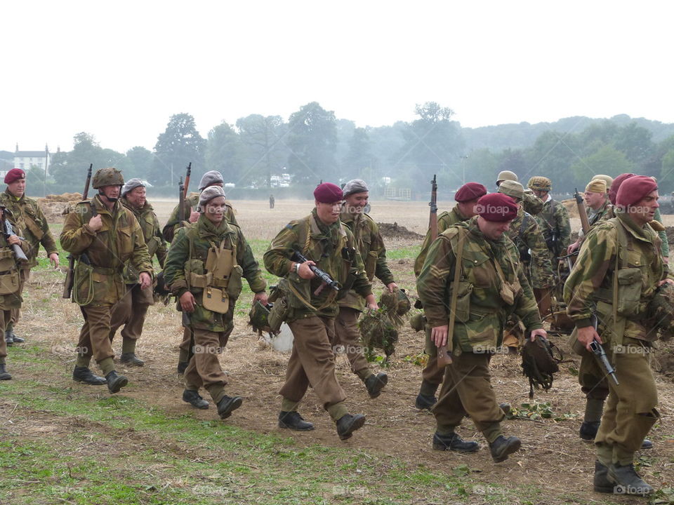 marching British atmy soldiers reenactment