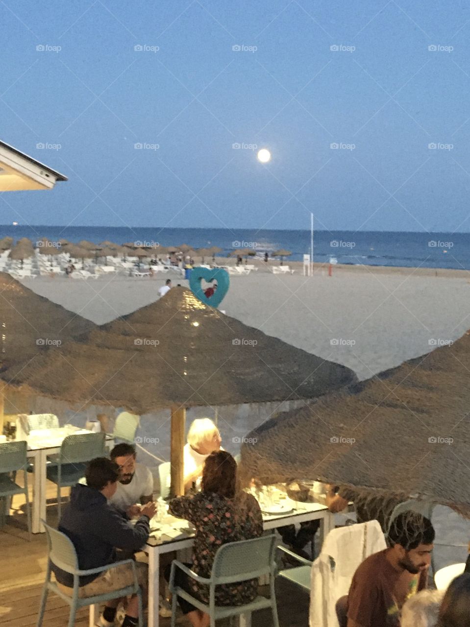 Dining on beach with moonlight 