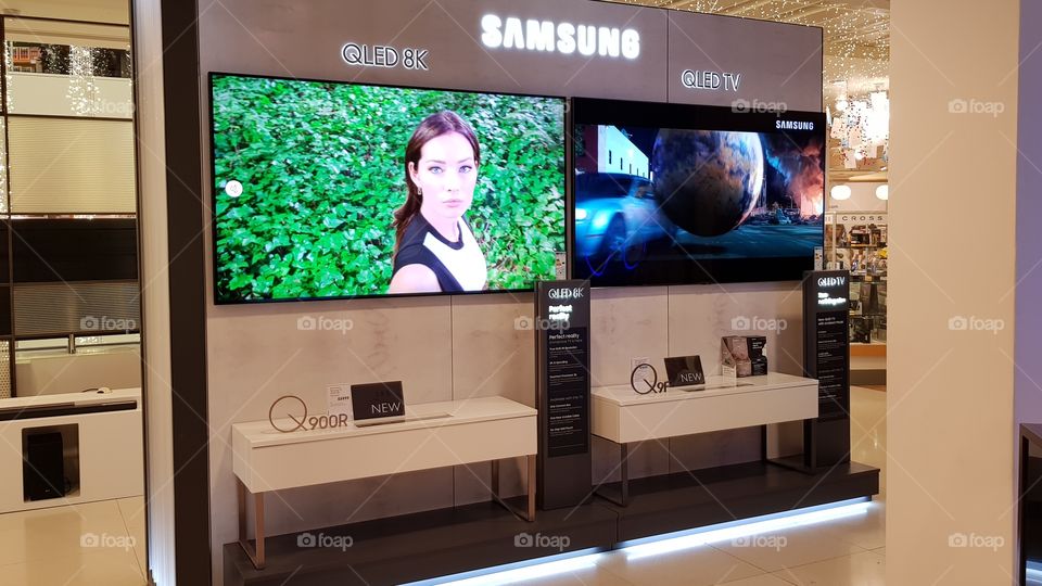 Samsung in-store televisions displayed well mounted 75" 8K and 4K televisions at Peter Jones Sloane square Kings road Chelsea