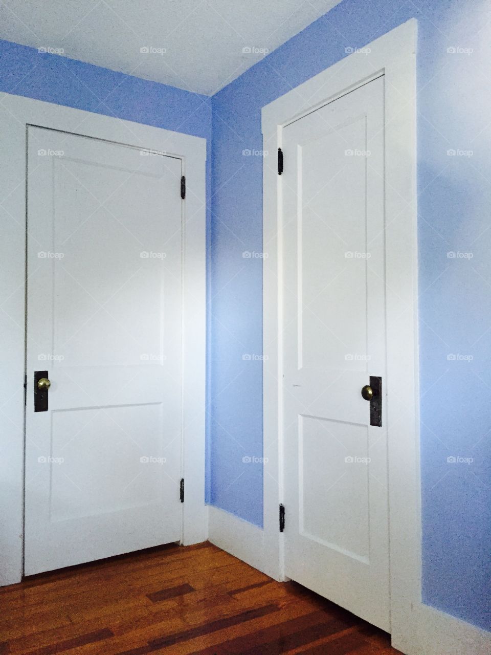 Doors in a blue room