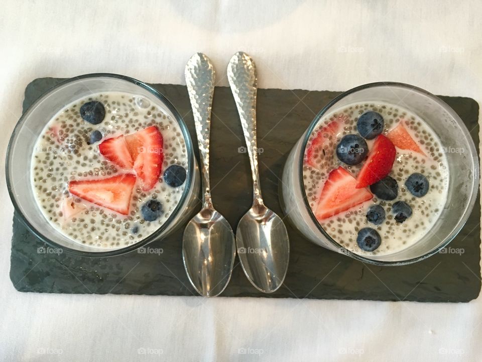 Healthy breakfast berries chia pudding with almond milk and cinnamon